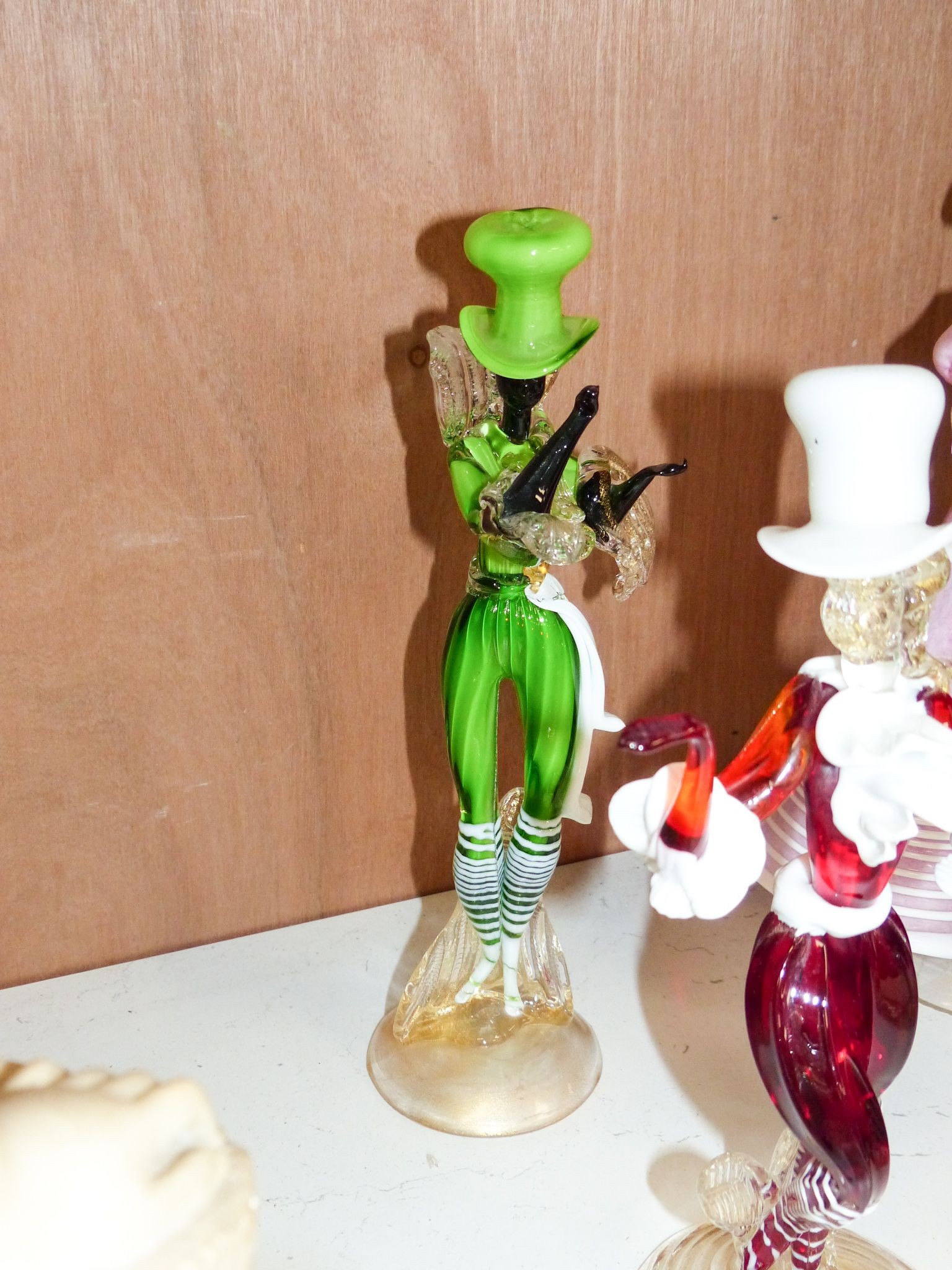 A group of eight Murano glass figures of dancers, tallest 32cm